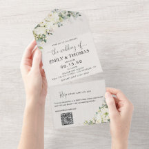 Elegante weiße Blumen auf einer Hochzeitseinladung