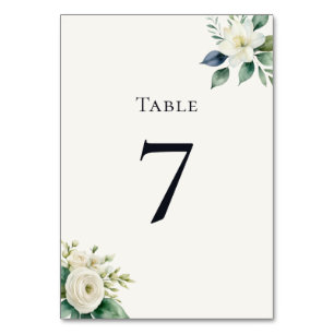 Elegante weiße Blumen- und Grünpflanzen-Hochzeitsf Tischnummer