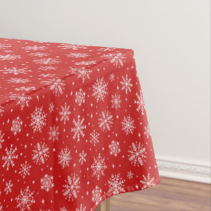 Elegante weiße Schneeflocken auf rotem Hintergrund Tischdecke