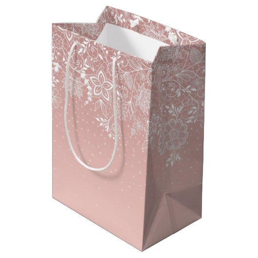 Elegante weiße Spitze mit Blumen und Mittlere Geschenktüte (Rückseite Schrägansicht)