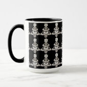 Elegante weiße Weihnachtsschmuck über schwarz Tasse (Links)