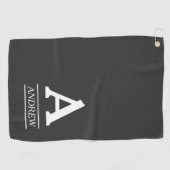 Eleganter Anfangsbuchstabe und graues Golfhandtuch (Horizontal)