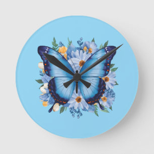Eleganter blauer Schmetterling auf Blumen Runde Wanduhr