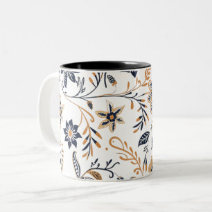 Eleganter blauer und goldener Blumenmuster-Becher Zweifarbige Tasse