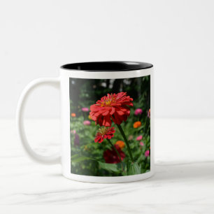 Eleganter Blumengarten in Rot-Orange Zweifarbige Tasse