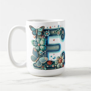 Eleganter floraler Buchstabe E mit Schmetterlingen Kaffeetasse