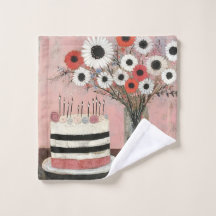 Eleganter Geburtstagskuchen und Gerbera-Blüten
