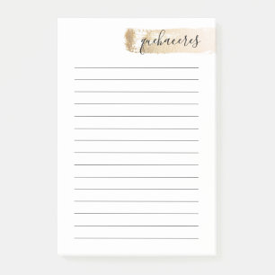 Eleganter Goldbürsten-Schlagmann weist Spanischen Post-it Klebezettel