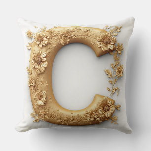 Eleganter goldener Buchstabe C mit zarten Blumen Kissen