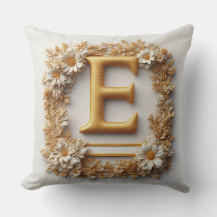 Eleganter goldener Buchstabe E mit zarten Blumen Kissen
