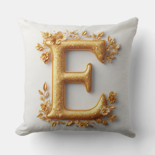 Eleganter goldener Buchstabe E mit zarten Blumen Kissen