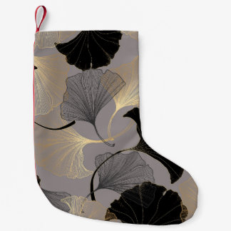 Eleganter goldener Ginkgo, Vintager Hintergrund. Kleiner Weihnachtsstrumpf