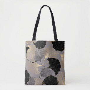 Eleganter goldener Ginkgo, Vintager Hintergrund. Tasche