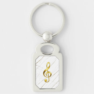 Eleganter goldener Violinschlüssel auf schwarzem M Schlüsselanhänger