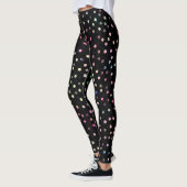 Eleganter irrisierender Glitzer weist ein schwarze Leggings (Links)