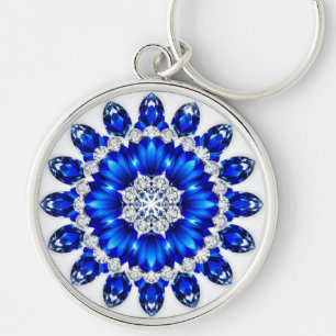 Eleganter Kranz verziert mit blauen Blumen Schlüsselanhänger