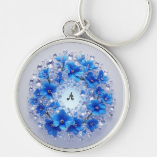 Eleganter Kranz verziert mit blauen Blumen Schlüsselanhänger
