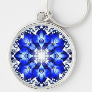Eleganter Kranz verziert mit blauen Blumen Schlüsselanhänger