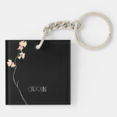 Eleganter Minimalist aus schwarzem Blumen Schlüsselanhänger (Rückseite)