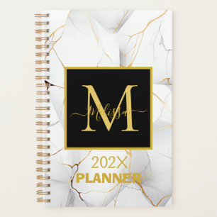 Eleganter Name des Monogrammes in weiß und goldmar Planer