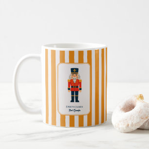 Eleganter Nussknacker auf den gelben Streifen Kaffeetasse