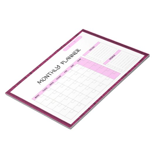 Eleganter rosafarbener weißer leerer Monatskalende Notizblock (angewinkelt)
