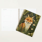 Eleganter Rotfuchs und grünes Laubwerk Planer (Anzeige)