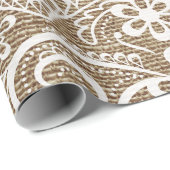 Eleganter schicker Spitze-Dekor auf rustikaler Geschenkpapier (Rolleneckpunkt)