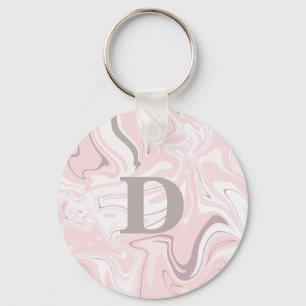 Eleganter unbedeutender rosa und weißer schlüsselanhänger