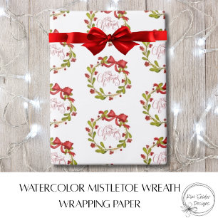 Eleganter Wasserfarben-Mistelzweig-Kranz und roter Geschenkpapier