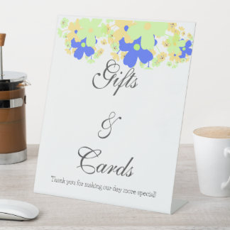 Elegantes Blumendesign gelb-blau Sockelschild