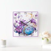 Elegantes Blumendesign mit Lila und blauen Akzente Quadratische Wanduhr (Zuhause)
