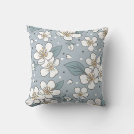 Elegantes Blumenmuster auf weichblauem Hintergrund Kissen