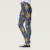 Elegantes gelbes Blumenmuster auf blau Leggings (Links)