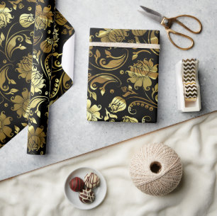 Elegantes Gold- und Schwarz-Flora-Muster Geschenkpapier