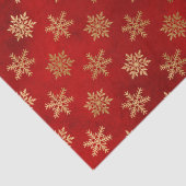 Elegantes goldfarbenes niedliches Schneeflockenmus Seidenpapier (Detail)