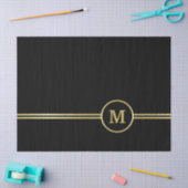 Elegantes Goldmonogramm auf schwarz Seidenpapier (Basteln)