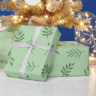 Elegantes grünes Blatt-Geschenkpapier auf hellgrün Geschenkpapier