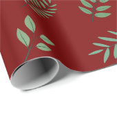 Elegantes grünes Leaf-Wrapping Paper über Deep Red Geschenkpapier (Rolleneckpunkt)