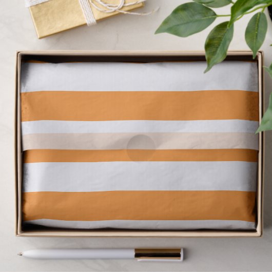Elegantes, helles, orangefarbenes und weiß gestrei seidenpapier