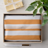 Elegantes, helles, orangefarbenes und weiß gestrei seidenpapier (Geschenk)