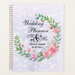 Elegantes Hochzeitspaar Herr und Frau mit rosa Blu Planer