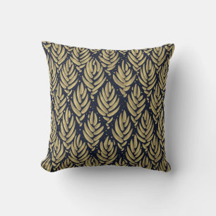 Elegantes Kissen mit goldenem Blatt und marineblau