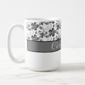 Elegantes Monogramm- und Blumenmuster Kaffeetasse (Links)