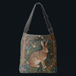 Elegantes Retro-Boho Kaninchenwald mit Blüte Tragetaschen Mit Langen Trägern<br><div class="desc">Ein elegantes böhmisches, elegantes Kaninchenwerk, in dem die Pracht der Natur zeitlose Kunst trifft. Set vor einer üppigen Waldkulisse, dieses exquisite Stück besticht durch die ruhige Schönheit eines grünen Waldes, reich an faszinierenden Details der Flora und der mächtigen Bäume. Das braune Kaninchen beachtet seine Umgebung inmitten eines üppig blühenden Laub...</div>