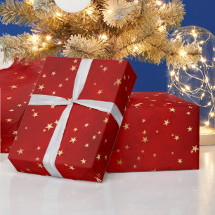 Elegantes Rot und Gold Weihnachtsstern-Muster Geschenkpapier