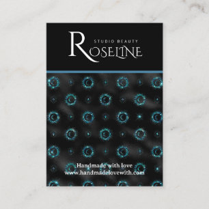 Elegantes Schmuckstück aus Schwarz und Gold Visitenkarte