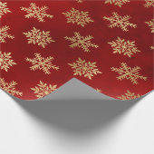 Elegantes Schneeflockenmuster in Rot und Gold Geschenkpapier (Ecke)