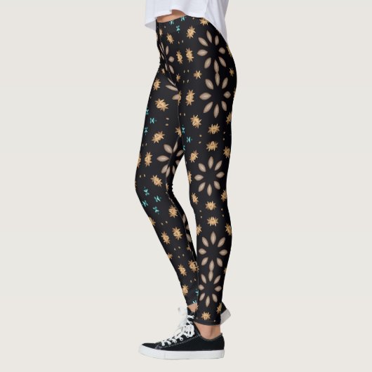 Elegantes Schwarz-Gold Geometrisches Blumenmuster Leggings (Links)