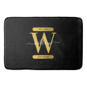 Elegantes Schwarz & Gold Monogram Modernes Skript Badematte (Vorderseite)